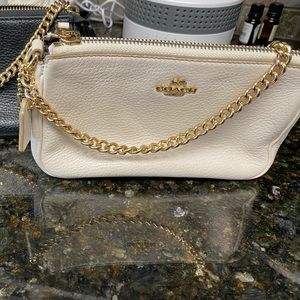 Coach soft pebble leather wristlet with gold chain